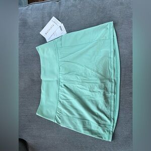 Athleta salutation stash pocket 14.5” skort